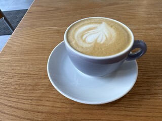 Cup of cappuccino on the table