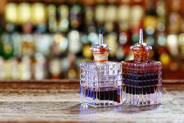 Measuring dispensers for bitters