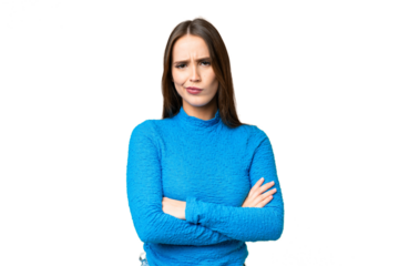 Young beautiful woman over isolated chroma key background feeling upset