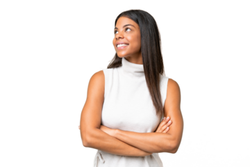 Young African american woman over isolated background looking up while smiling