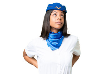Airplane stewardess African american woman over isolated background suffering from backache for...