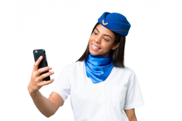 Airplane stewardess African american woman over isolated background making a selfie