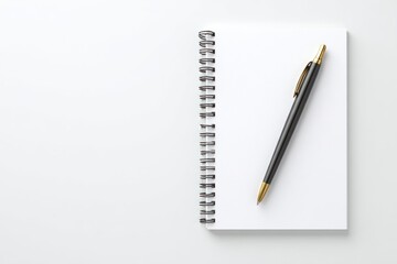 Blank spiral notebook with empty pages beside a sleek black pen on a minimalist surface, perfect for writing notes and ideas for any project