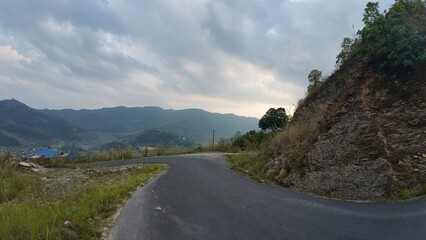 Winding Mountain Road Through Hills with Scenic Valley View – Rural Nepal Landscape

