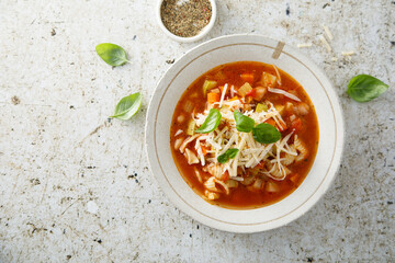 Traditional minestrone soup with cheese	