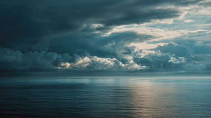 Fototapeta premium Moody Sky Over Calm Sea with Distant Horizon.