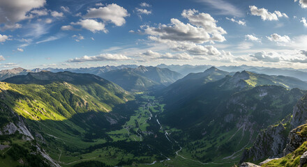 Fototapeta premium Scenic Mountain Valley View with Green Hills and Cloudy Sky