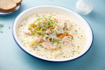 Salmon soup with cream and dill
