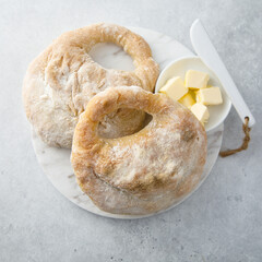 Traditional kalach bread with butter