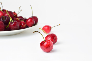 Close up. Cherries on a white background. Front view.