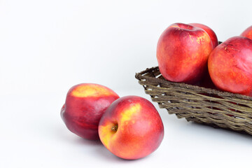 Close up, nectarine on white background.	