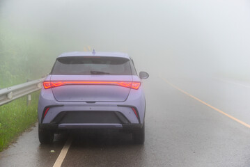 Cars on the road a poor visibility