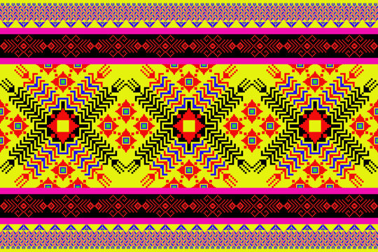  Vibrant pixel textile inspired by northeastern Thai (Isan) weaving traditions. The bold central sunburst motif radiates out in pixelated zigzag waves, using yellow, red, black, and electric blue. A 