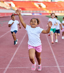 Young children having athletic exercise class running on the track, healthy lifestyle and children...
