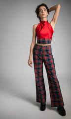 Studio session of girl wearing fashion clothes and posing. Copy space