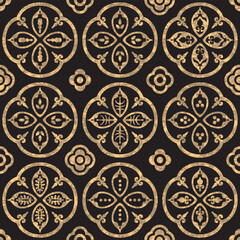 Vector seamless pattern of gold watercolor painted ornate tiles on a black background