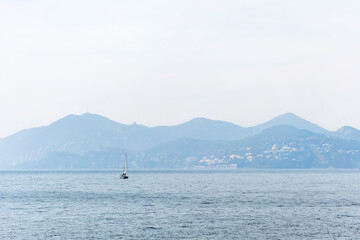 Misty mountains and coastline near Cannes viewed from Sainte-Marguerite Island