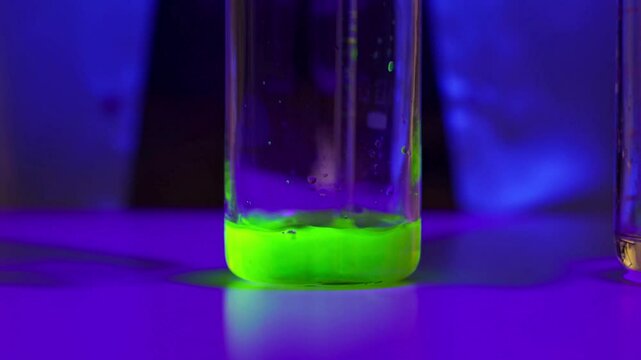 Close-Up of Glowing Luminol Reaction &ndash; Chemiluminescence Science Experiment in 4K Ultra HD