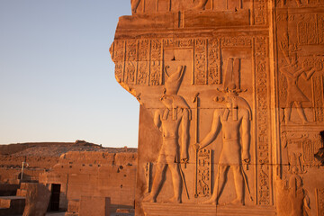 Ancient egyptian carvings on the walls of Kom Ombo temple in Aswan, Egypt