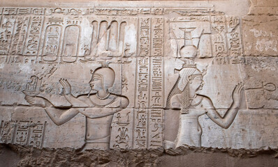 Ancient egyptian carvings on the walls of Kom Ombo temple in Aswan, Egypt