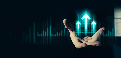 hand of businessman interactive touching a holographic of transaction financial network data...