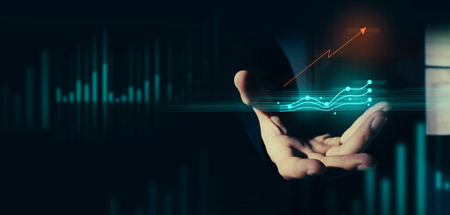 hand of businessman interactive touching a holographic of transaction financial network data...