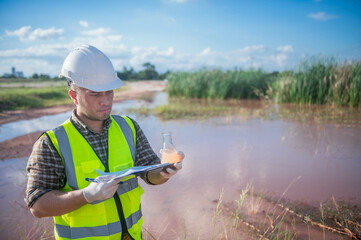 An environmental expert investigates the life in a natural body of water to study its ecosystem.