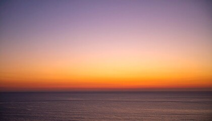 Obraz premium Bold-toned dusk sky casting radiant purple-orange hues on a minimal textured surface with crisp shadow geometry.