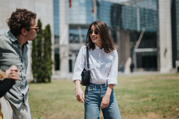 Smiling friends standing outdoors in a modern urban area, enjoying a casual conversation.