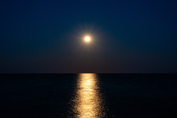 Full harvest moon over Lake Michigan