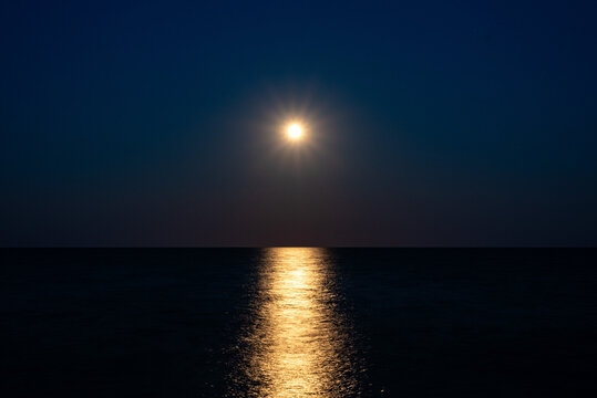 Full harvest moon over Lake Michigan