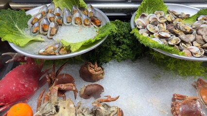 Seafood Display with Mussels, Clams, and Crabs on Ice