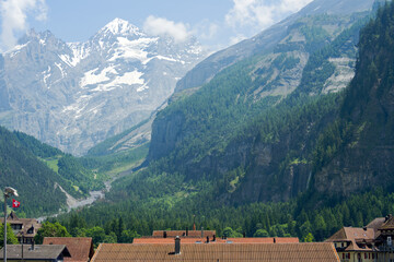 Scenic view of alpine mountain panorama at village of Kandersteg on a sunny spring afternoon. Photo...