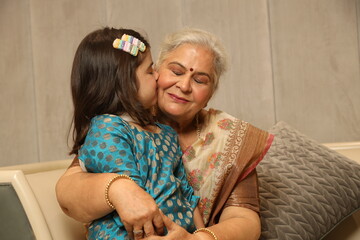 Portrait of Indian Happy moments with grandmother, senior lady spending quality time with her grand...