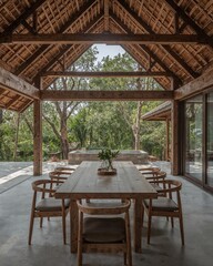 Fototapeta premium Dining area of a Khmer stilt house that fuses ancient architecture with minimalism designed in a teakwood and misty gray theme