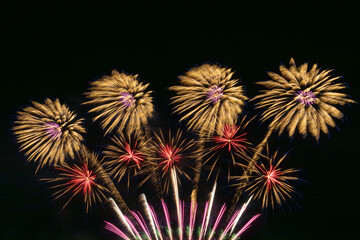 Colorful Fireworks Display Over Water