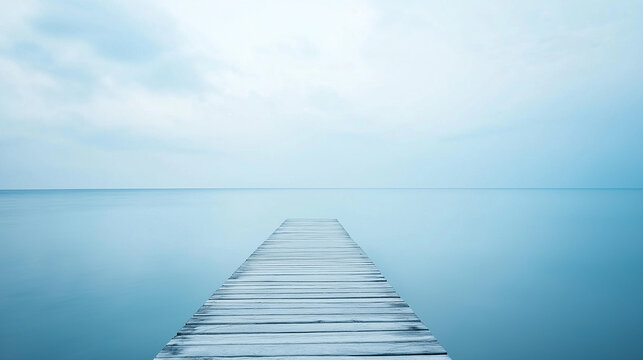 Wooden pier stretching into calm ocean, a serene escape into simplicity and peace