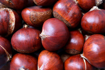 Obraz premium Full frame macro shot of chestnuts. Food background.