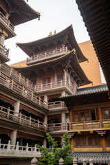 Complex layers in Jing'an Temple in Shanghai, China. The rebuilt complex exhibits traditional...