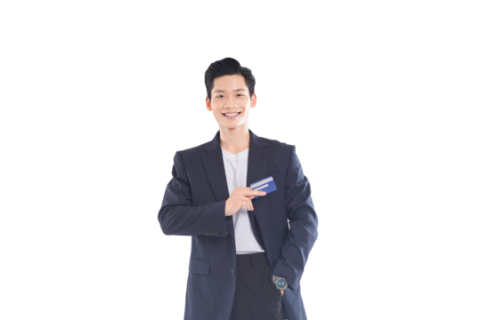 Asian businessman holding credit card, confident expression, financial technology concept