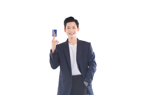 Asian businessman holding credit card, confident expression, financial technology concept