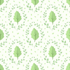 Elegant tile pattern with green leaves and wreaths