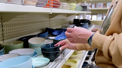Selecting Colorful Dinnerware While Walking Through the Store Aisle Can Be Fun and Enjoyable