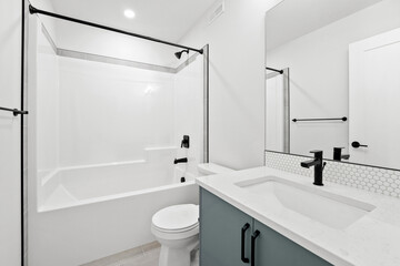 Bathroom with a white toilet and sink