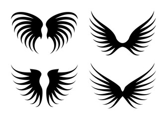 A collection of four stylized black wing silhouettes isolated on a white background for graphic design elements