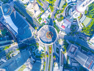 Aerial View of Shanghai skyscrapers with urban traffic.