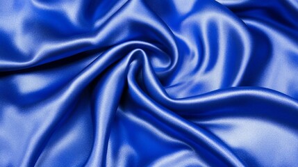 Obraz premium Close-up of deep blue satin fabric folds. Possible use Textile catalog, fashion design, or website background