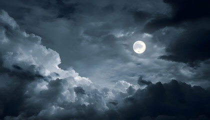 A spooky night sky with a full moon and clouds   -