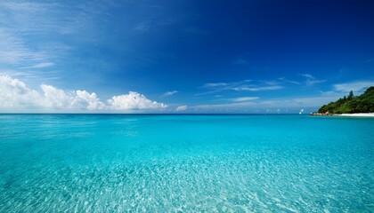 Fototapeta premium beautiful seascape with clear blue water and blue sky