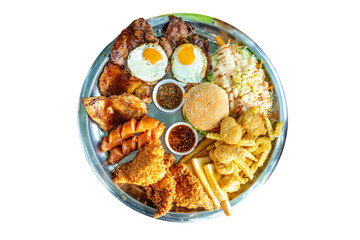 Top view of fried egg burger mix steak and sausage with sauce, focus selective